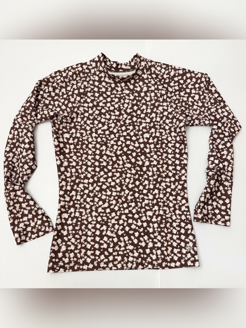 This Albion Fit Rash Guard Brown and White Floral - S